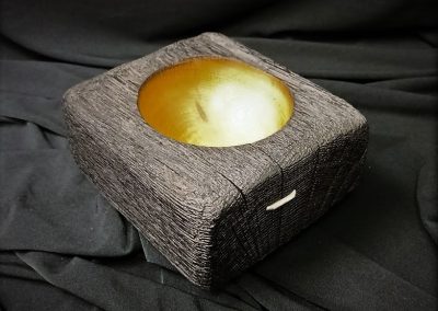 This bowl is 6” square by 3” high (approx) It is made from Green (unseasoned) oak A cube of oak 6x6x6 is burned on a fire-pit until it is well charred I then cut it in half to form two bowls The bottoms are finished and the bowls cut. The black surface is wire brushed and polished with boot polish the bottom and insides are finished with Microcrystaline Wax. Finaly a staple is added to stabilize the crack and for affect These bowls are perfect as a change and keys bowl for the man of the house and sell for £40.